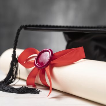 gradution diploma toga hat